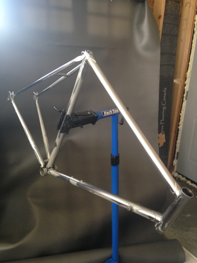 Sanding the bicycle frame