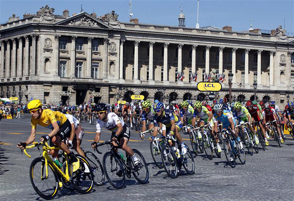 July 22, 2012 Team Sky Procycling rider and leader's yellow jersey Wiggins of Britain cycles during the final 20th stage of the 99th Tour de France cycling race between Rambouillet and Paris