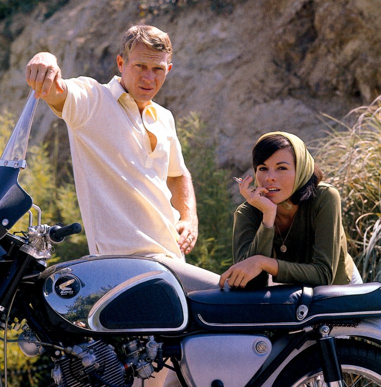 Steve McQueen and Neile Adams with their Honda motorcycle